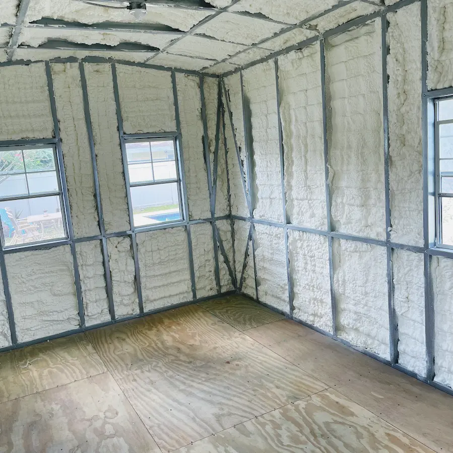 Closed-cell spray foam insulation applied to wall cavities in a residential project in Lansdale